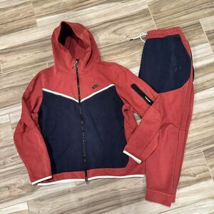 red and dark blue nike tech fleece sweatsuit hoodie and pants